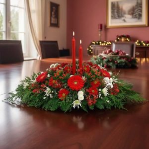 Celebra esta temporada con nuestros exclusivos arreglos navideños en CDMX, elaborados con flores frescas, follajes verdes, esferas, piñas, velas y listones decorativos que transmiten calidez y espíritu festivo.
