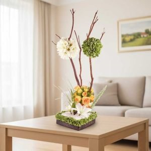 Un centro de mesa para bautizo es el detalle ideal para realzar la belleza de este momento especial. Con flores frescas en tonos suaves como blanco, rosa, azul o crema, aportan ternura, pureza y alegría a la celebración, creando un ambiente cálido y elegante para compartir con familia y amigos.