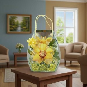 Orquídea amarilla fresca en maceta elegante, disponible para entrega a domicilio en Ciudad de México.