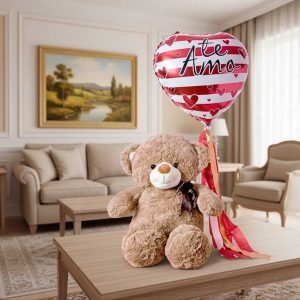 Sorprende a esa persona especial con un osito de peluche acompañado de un globo con la frase “Te Amo”. 💖