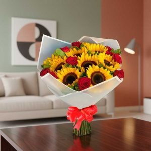 El ramo de girasoles con rosas es un detalle lleno de vida, color y elegancia, perfecto para sorprender en cualquier ocasión especial. La luminosidad de los girasoles se une con la pasión y ternura de las rosas, creando un arreglo floral único que transmite alegría, amor y gratitud