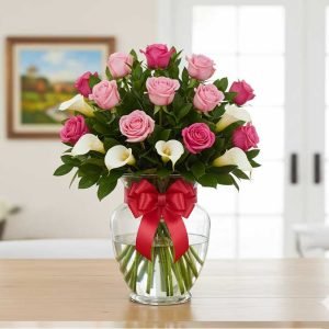 Los arreglos de rosas rosadas con alcatraces combinan la dulzura y ternura del color rosado con la elegancia única de los alcatraces.